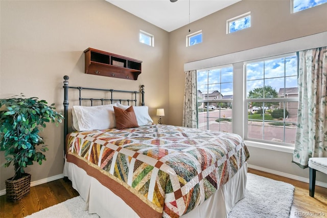 bedroom featuring dark wood-type flooring