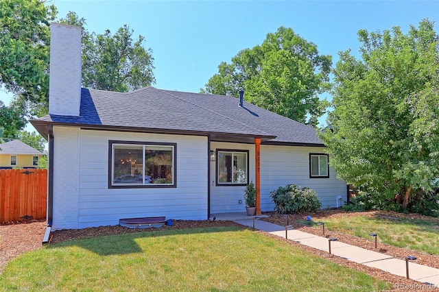 2337 S Franklin St, Denver, CO 80210 - view of front of home with a chimney