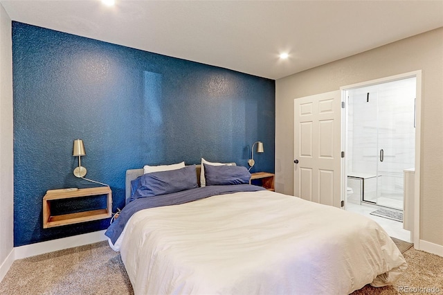 2337 S Franklin St, Denver, CO 80210 - carpeted bedroom featuring baseboards and ensuite bathroom