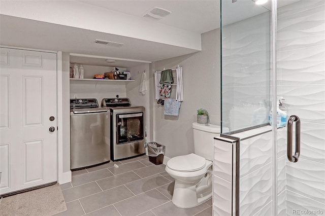 2337 S Franklin St, Denver, CO 80210 - bathroom featuring washer and dryer, tile patterned flooring, and a stall shower