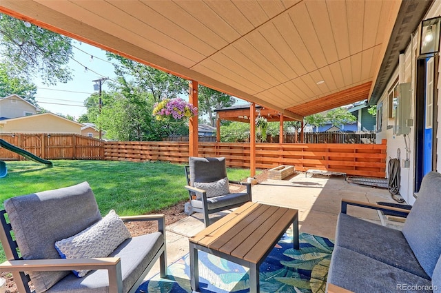 2337 S Franklin St, Denver, CO 80210 - fenced backyard featuring a patio area and an outdoor hangout area