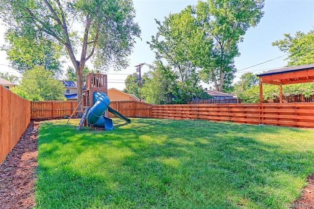 2337 S Franklin St, Denver, CO 80210 - fenced backyard with a playground