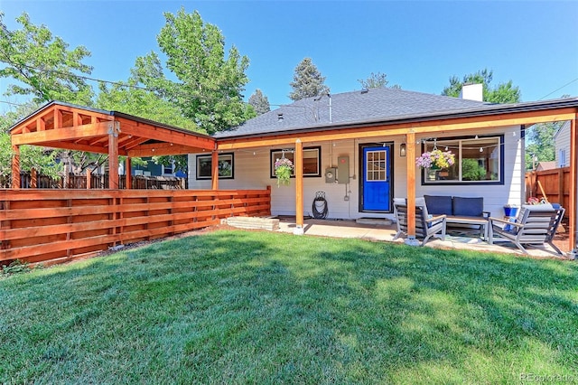 2337 S Franklin St, Denver, CO 80210 - back of house featuring outdoor lounge area and a chimney
