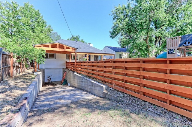 2337 S Franklin St, Denver, CO 80210 - view of yard featuring an attached garage