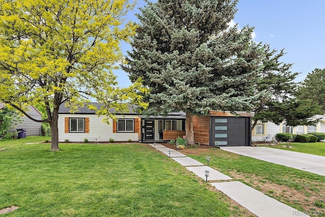 2865 S Cherry Way, Denver, CO 80222 - view of front facade featuring concrete driveway, a front yard, and an attached garage