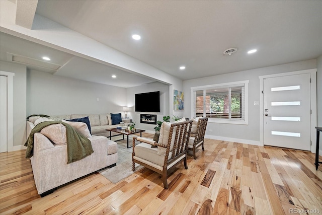 2865 S Cherry Way, Denver, CO 80222 - living room with light wood-style floors, baseboards, and recessed lighting