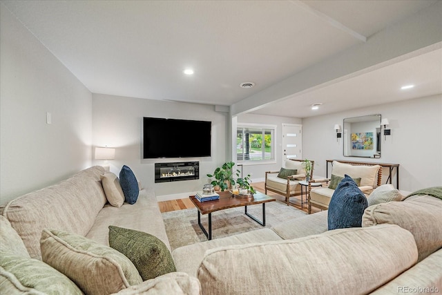 2865 S Cherry Way, Denver, CO 80222 - living area featuring wood finished floors, baseboards, and recessed lighting