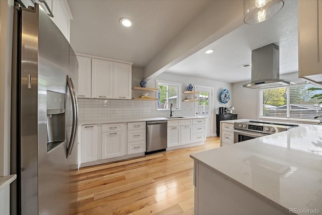 2865 S Cherry Way, Denver, CO 80222 - kitchen with appliances with stainless steel finishes, a sink, island exhaust hood, recessed lighting, and open shelves