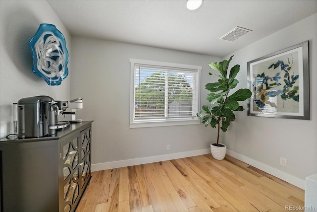 2865 S Cherry Way, Denver, CO 80222 - dining space with light wood finished floors and baseboards
