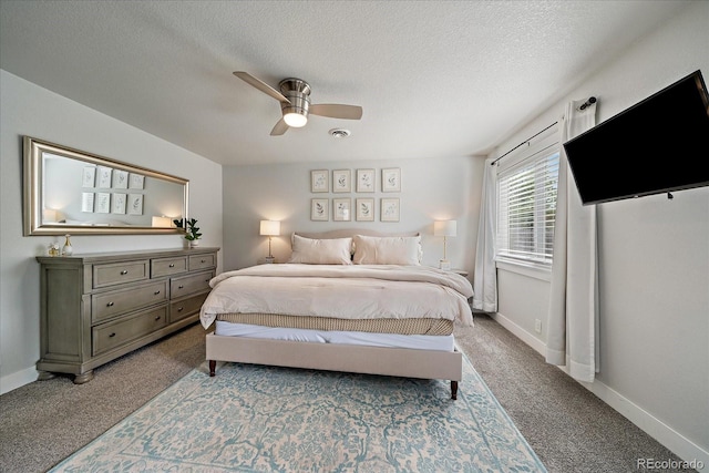 2865 S Cherry Way, Denver, CO 80222 - carpeted bedroom featuring a textured ceiling, a ceiling fan, and baseboards