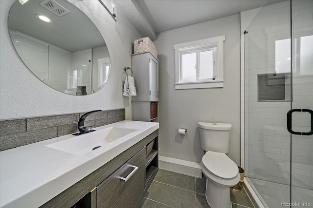 2865 S Cherry Way, Denver, CO 80222 - bathroom with toilet, vanity, a shower stall, tile patterned flooring, and baseboards