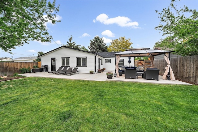 2865 S Cherry Way, Denver, CO 80222 - back of property with a gazebo, an outdoor living space, and a patio