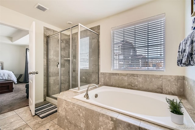 bathroom featuring a stall shower, visible vents, connected bathroom, tile patterned floors, and a garden tub