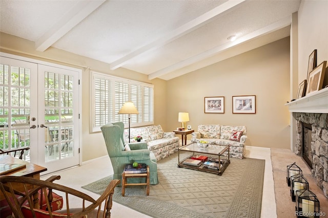 interior space featuring lofted ceiling with beams, a fireplace, and french doors