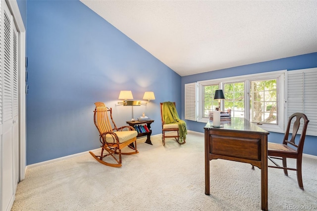 living area featuring vaulted ceiling and light colored carpet