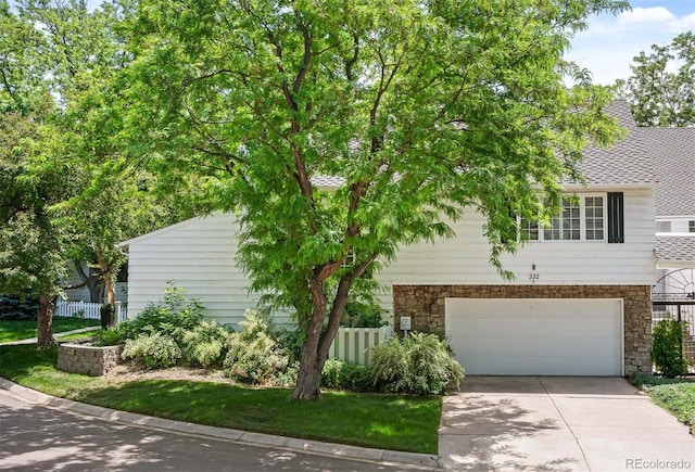 view of front of property featuring a garage