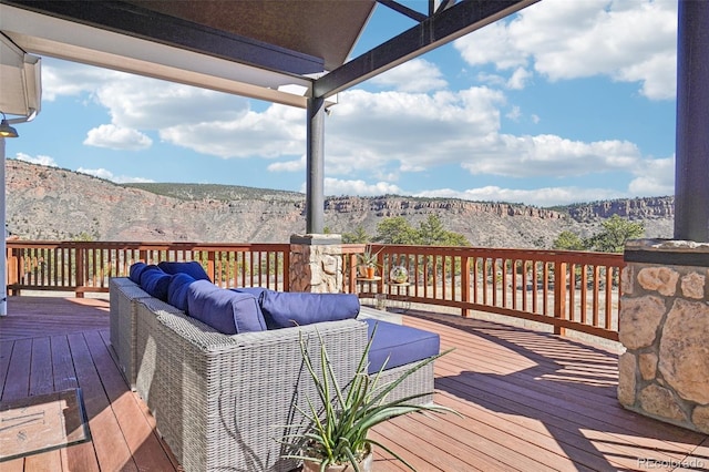 700 Apple Ridge Rd, Lyons, CO 80540 - deck featuring an outdoor living space and a mountain view