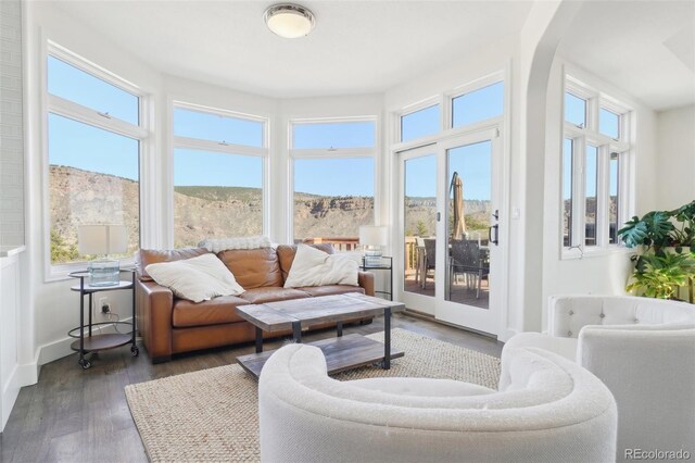 700 Apple Ridge Rd, Lyons, CO 80540 - sunroom / solarium with healthy amount of natural light and arched walkways