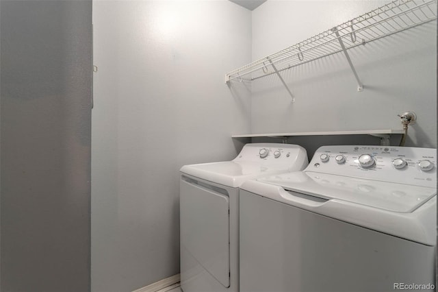 laundry room with washer and clothes dryer