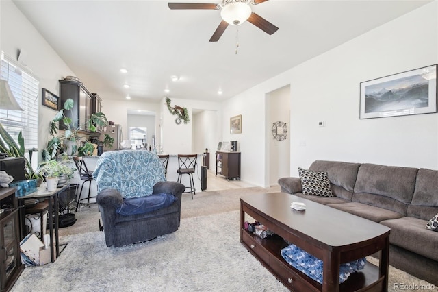 310 Quincy Rr Ave, Keenesburg, CO 80643 - living area featuring light colored carpet, a ceiling fan, and recessed lighting
