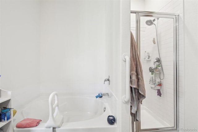 310 Quincy Rr Ave, Keenesburg, CO 80643 - bathroom featuring a bath and a stall shower