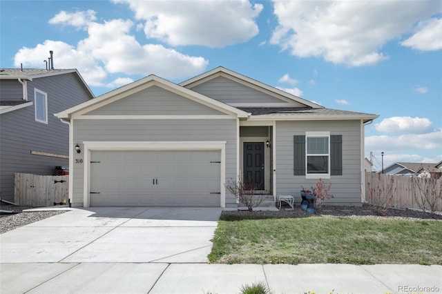 310 Quincy Rr Ave, Keenesburg, CO 80643 - ranch-style home with a garage, a front lawn, concrete driveway, and fence