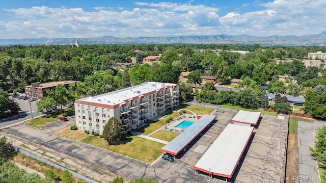 7801 W 35th Ave Unit 1, Wheat Ridge, CO 80033 - drone / aerial view of a mountainous background and a pool area