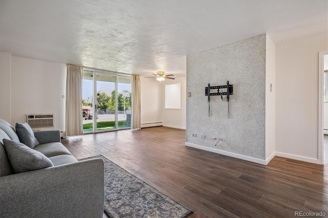 7801 W 35th Ave Unit 1, Wheat Ridge, CO 80033 - living area featuring baseboard heating, a wall mounted AC, wood finished floors, a ceiling fan, and a baseboard heating unit