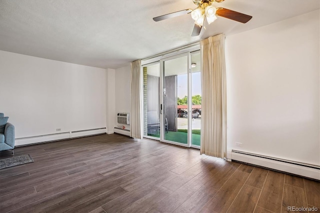 7801 W 35th Ave Unit 1, Wheat Ridge, CO 80033 - unfurnished room with a baseboard radiator, expansive windows, wood finished floors, and ceiling fan