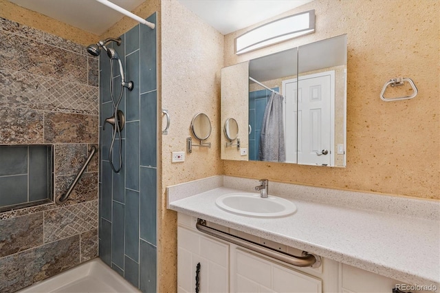 7801 W 35th Ave Unit 1, Wheat Ridge, CO 80033 - full bathroom featuring a tile shower and vanity