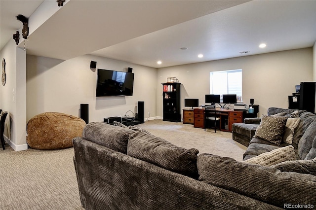 living area with light colored carpet, recessed lighting, baseboards, and visible vents