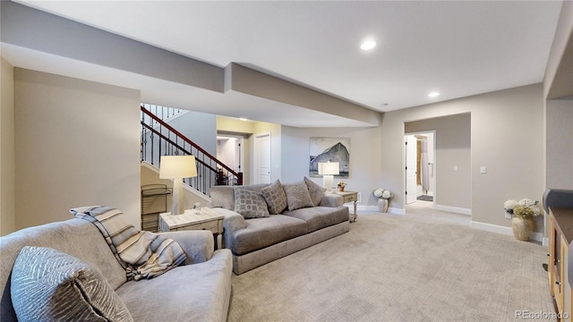 6945 Fargo Trl, Littleton, CO 80125 - living room featuring light carpet, stairway, and recessed lighting