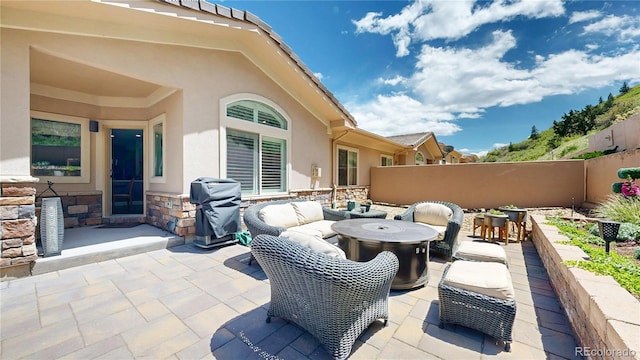 6945 Fargo Trl, Littleton, CO 80125 - view of patio / terrace featuring a grill, an outdoor living space, and outdoor dining space