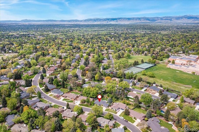 birds eye view of property with a residential view and a mountain view