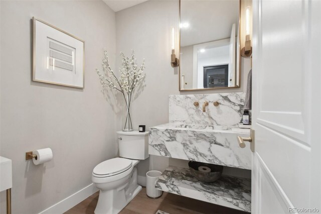 bathroom with toilet and sink