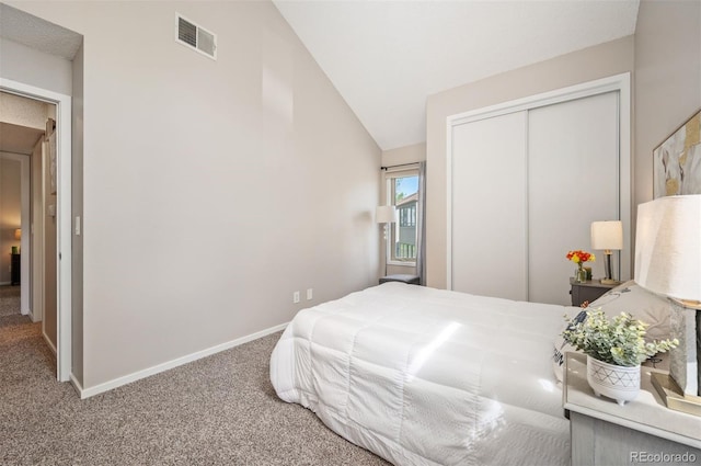 23585 Genesee Village Rd Unit E, Golden, CO 80401 - bedroom with carpet flooring, vaulted ceiling, and a closet