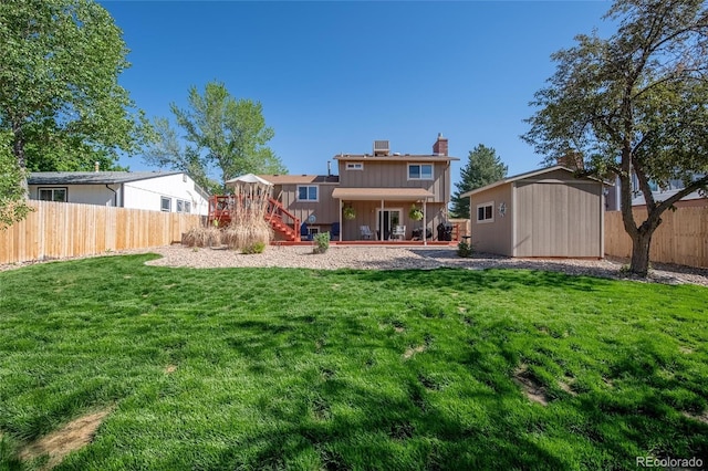 9700 W 88th Pl, Westminster, CO 80021 - back of property with a shed, an outdoor structure, stairway, a chimney, and a wooden deck