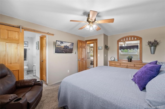 9700 W 88th Pl, Westminster, CO 80021 - bedroom featuring carpet, baseboards, ensuite bath, a ceiling fan, and a barn door
