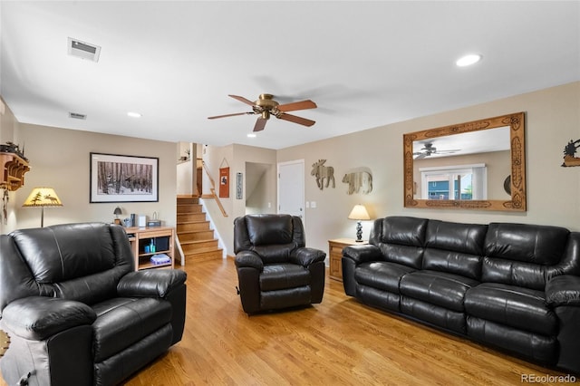 9700 W 88th Pl, Westminster, CO 80021 - living area featuring ceiling fan, wood finished floors, stairs, and recessed lighting
