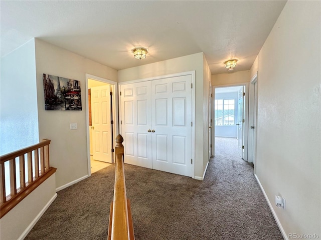 2033 Espana Way, Aurora, CO 80011 - hall with carpet floors and baseboards