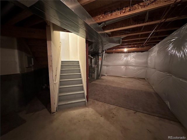 2033 Espana Way, Aurora, CO 80011 - unfinished basement featuring stairway and heating unit
