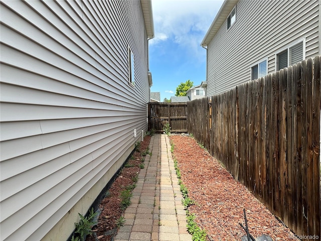 2033 Espana Way, Aurora, CO 80011 - view of property exterior with a fenced backyard