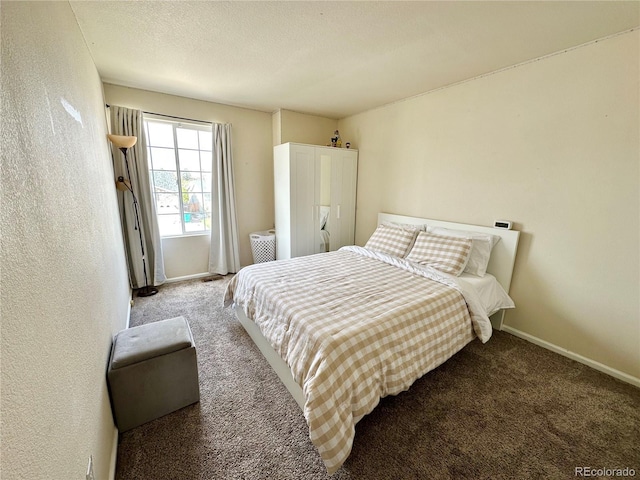 2033 Espana Way, Aurora, CO 80011 - bedroom featuring carpet floors and baseboards