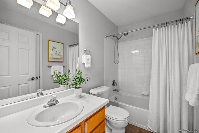 14712 Josephine St, Thornton, CO 80602 - full bathroom with vanity, shower / bath combination with curtain, and wood finished floors