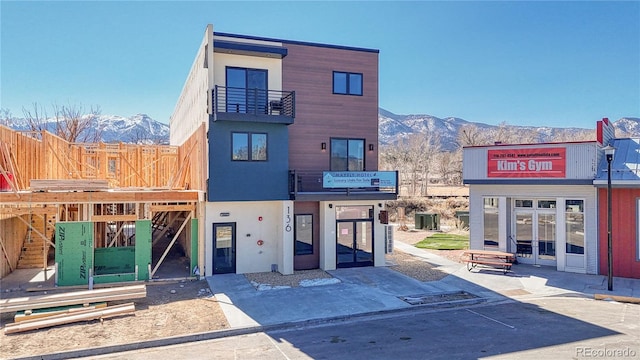 view of building exterior with a mountain view