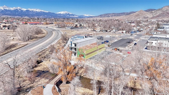 drone / aerial view featuring a mountain view