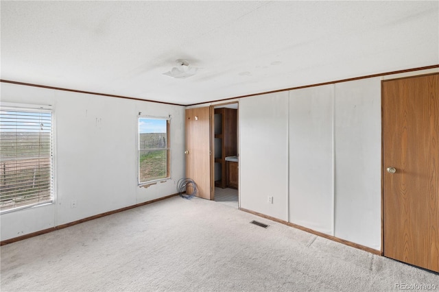 35275 Book Rd, Yoder, CO 80864 - unfurnished bedroom featuring baseboards and carpet