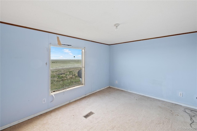 35275 Book Rd, Yoder, CO 80864 - carpeted spare room featuring ornamental molding and baseboards