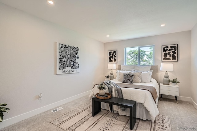 5555 Julian St, Denver, CO 80221 - bedroom featuring baseboards, recessed lighting, and light colored carpet