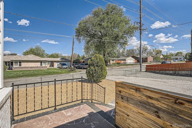 5555 Julian St, Denver, CO 80221 - view of patio with fence and a residential view